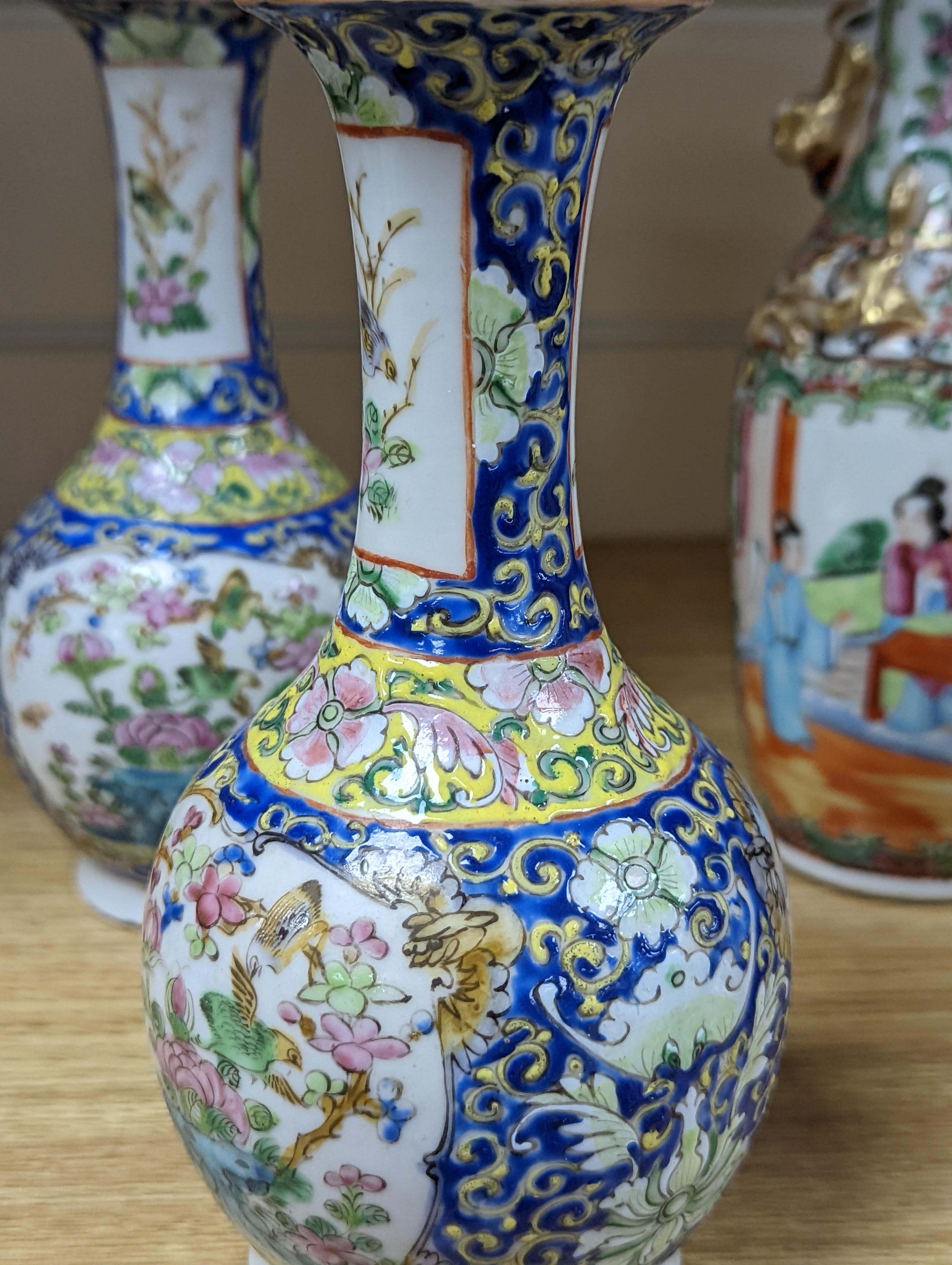 Four 19th century Chinese famille rose vases, 21cm